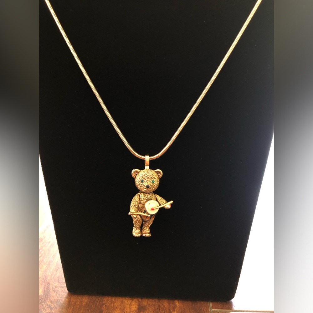 Vintage Batya Gold  Drummer Bear Pendant Necklace Green Gem Eyes Posable Legs